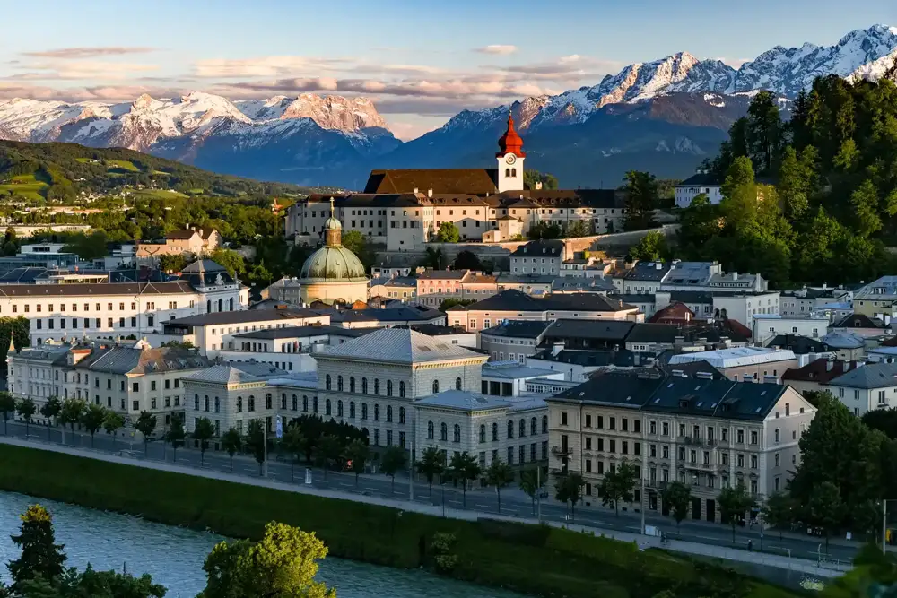 Salzburg old town beside the Salzach river with Hohensalzburg Fortress